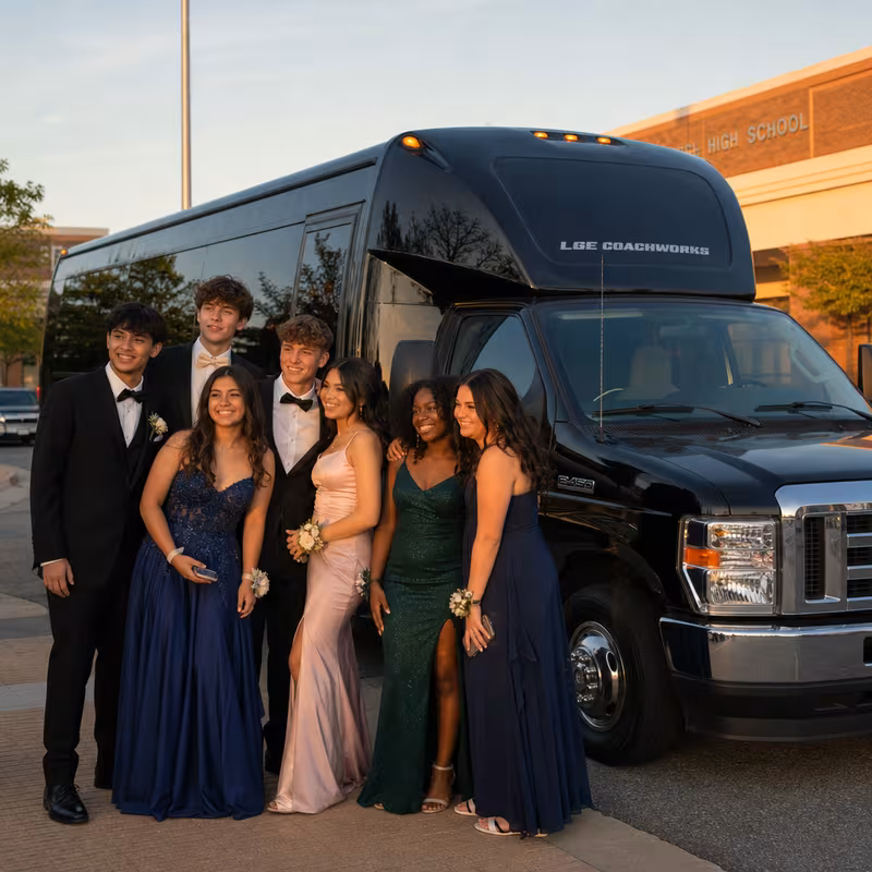 Group boarding a white charter bus for Prom & Homecoming Transportation transportation in Pittsburgh