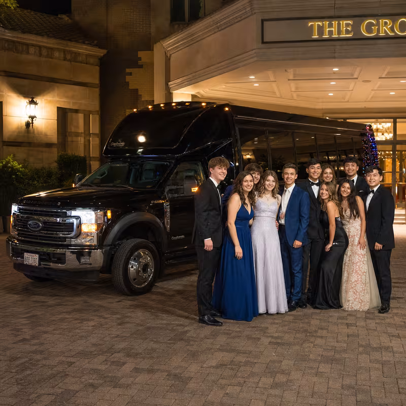 Party bus interior with wraparound leather seating and LED lighting in Pittsburgh