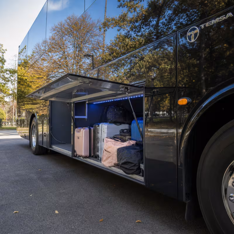 Party bus interior with wraparound leather seating and LED lighting in Pittsburgh