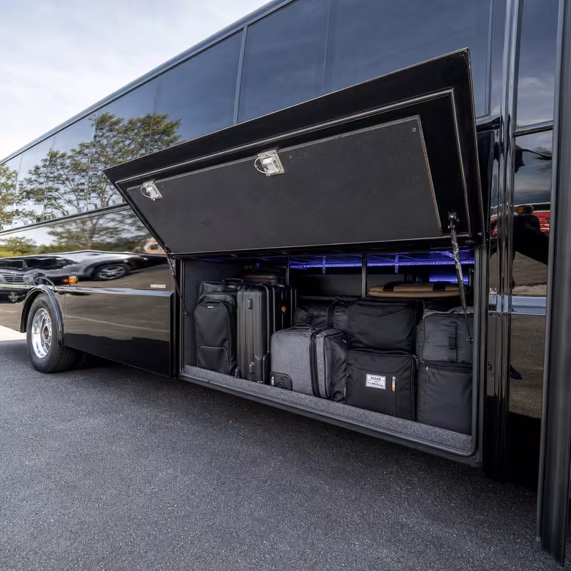 Party bus interior with wraparound leather seating and LED lighting in Pittsburgh