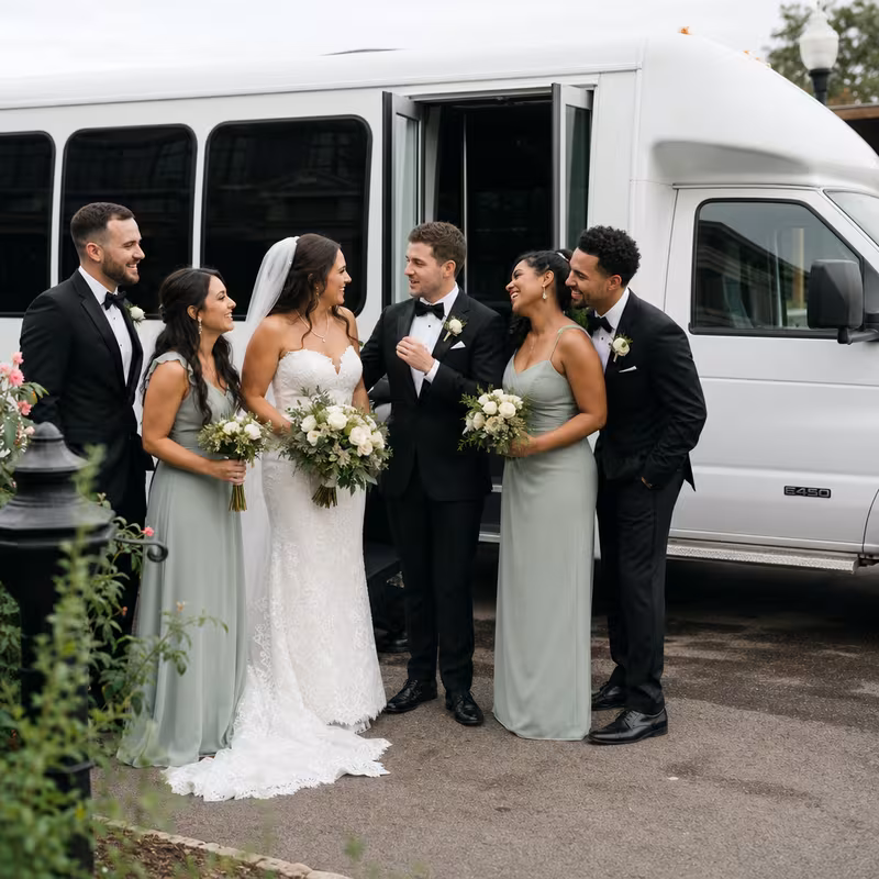 Passengers loading luggage while boarding an Pittsburgh group shuttle